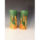 A pair of Bretby spill vases, modelled a