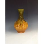 A Bretby Art Nouveau bottle vase, glazed