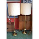 A pair of brass standard lamps