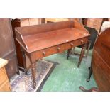 A Victorian mahogany wash stand, three quarter gallery, two short drawers to frieze, button