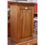 A mahogany reproduction wall mounted corner cabinet, made by T Spencer