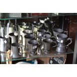 A 19th century pewter mug; others similar; a set of dairy measures; pairs of mugs, qty (12)