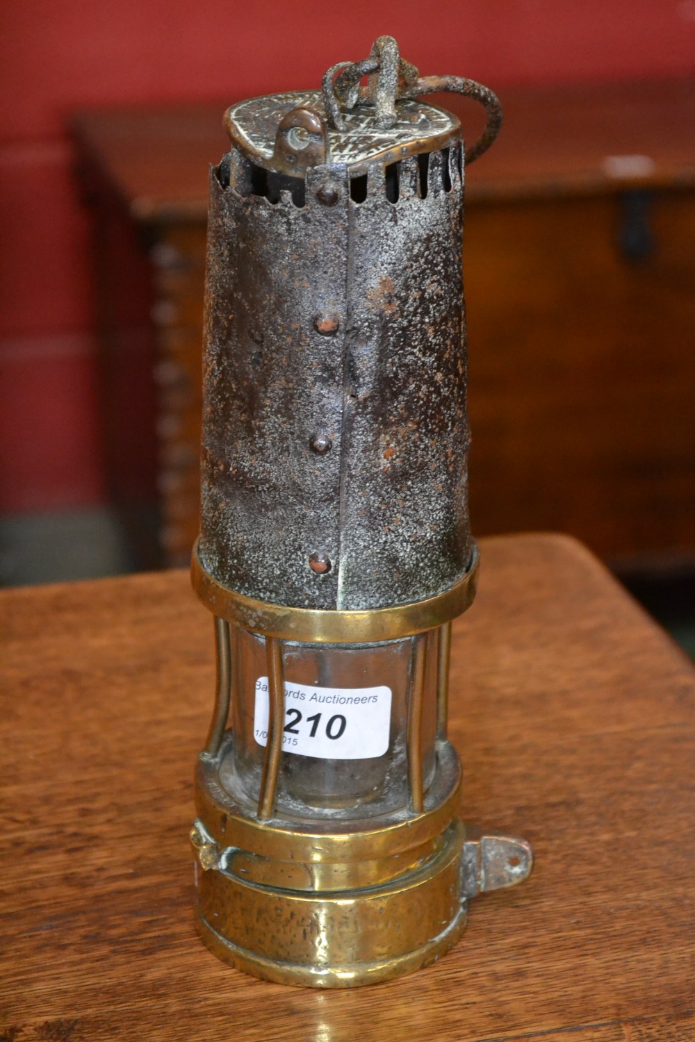 A Howatts' patent Deflector colliery lamp, brass cage and iron chimney, cast marks, No 419