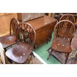 An oak barley twist dropleaf table and four oak wheelback chairs (5)