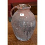A 15th century style terracotta, salt glazed pitcher, single handle, 35cm high