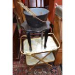 A reproduction towel rail; a retro tea trolley; a shaped occasional table; a cooking pot; a brass