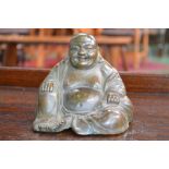 Chinese School, a bronze, of the rotund Buddha, seated, smiling, verdigris patination, 13.5cm wide