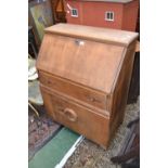 An oak bureau by Lebus Furniture, c.1950