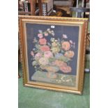 A framed woolwork picture, vase of flowers