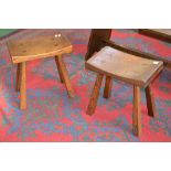 A pair of Monastic oak stools, rectangular tops signed with a nail by Tom Spencer