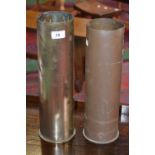 A pair of large French artillery shell casings, circa 1930.