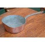 A copper cooking pot, stamped NW20