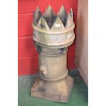 A crown topped chimney pot