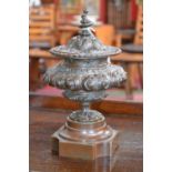 A 19th century French brown patinated bronze compressed campana table urn and cover, serpent