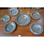 An 18th century pewter plate London touch marks, others 18th/19th century (6)