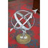 A reproduction sundial atlas anniversary clock, cast base