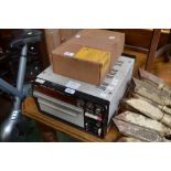 A Bell & Howell Oscillograph S-137 and three rolls of Kodak Linagraph Direct print paper