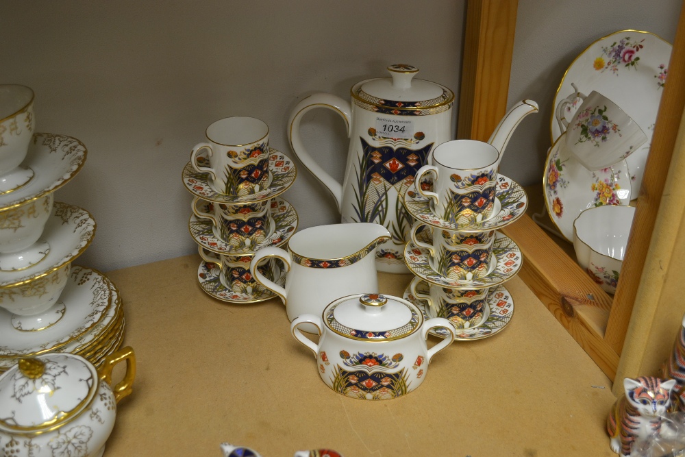 A Royal Crown Derby Rutland coffee service, comprising coffee pot, six coffee cans and saucers,