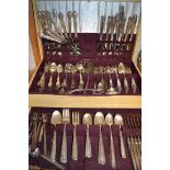 A canteen of cutlery containing three part sets