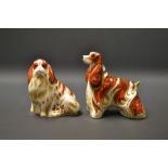 A Royal Crown Derby paperweight, American Spaniel, gold stopper, boxed; another, Cavalier King