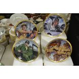 A set of John Wayne Franklin Mint collector's plates, with certificates; other John Wayne