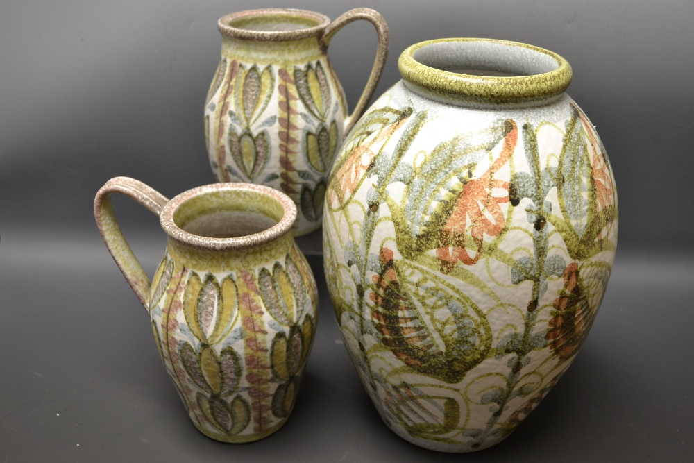 A Denby stoneware ovid vase, designed by Glyn Colledge, hand painted with leafy motifs in shades of