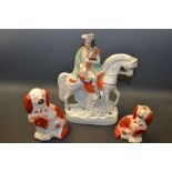 Ceramics - a Stafforshire figure Scotch Piper on Horse back, 29cm high;  a graduated pair of seated