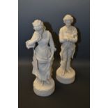 A pair of Robinson and Parian figures, Dandy and Farm girl, moulded circular bases, impressed