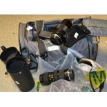 Cameras- an Olympus OM2 body;  an Olympus MD body ; a 28mm, 50mm, 35-80mm, , 75-150mm, Vivitar