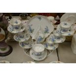 A Royal Albert Forget-me-Not pattern tea set for six, milk and sugar, sandwich plate