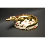 A Royal Crown Derby paperweight, Crocodile, gold stopper, printed marks in red, boxed