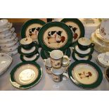 A Henry & Co. four-setting dinner service, forest green border with farmyard animal scenes,