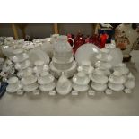 A comprehensive Royal Doulton Carnation pattern tea and dinner service for twelve, large quantity