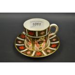 A Royal Crown Derby 1128 coffee can and saucer