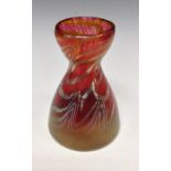 A Loetz style red iridescent conical flask glass vase, with gold and silver swirls, 11.5cm high