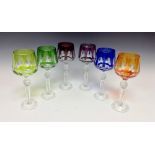A harlequin set of six Bohemian hock glasses, cut knopped stems, spreading circular feet,