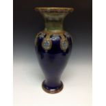 A Royal Doulton baluster vase, designed by Christine Abbot, incised with teardrops of flower heads,