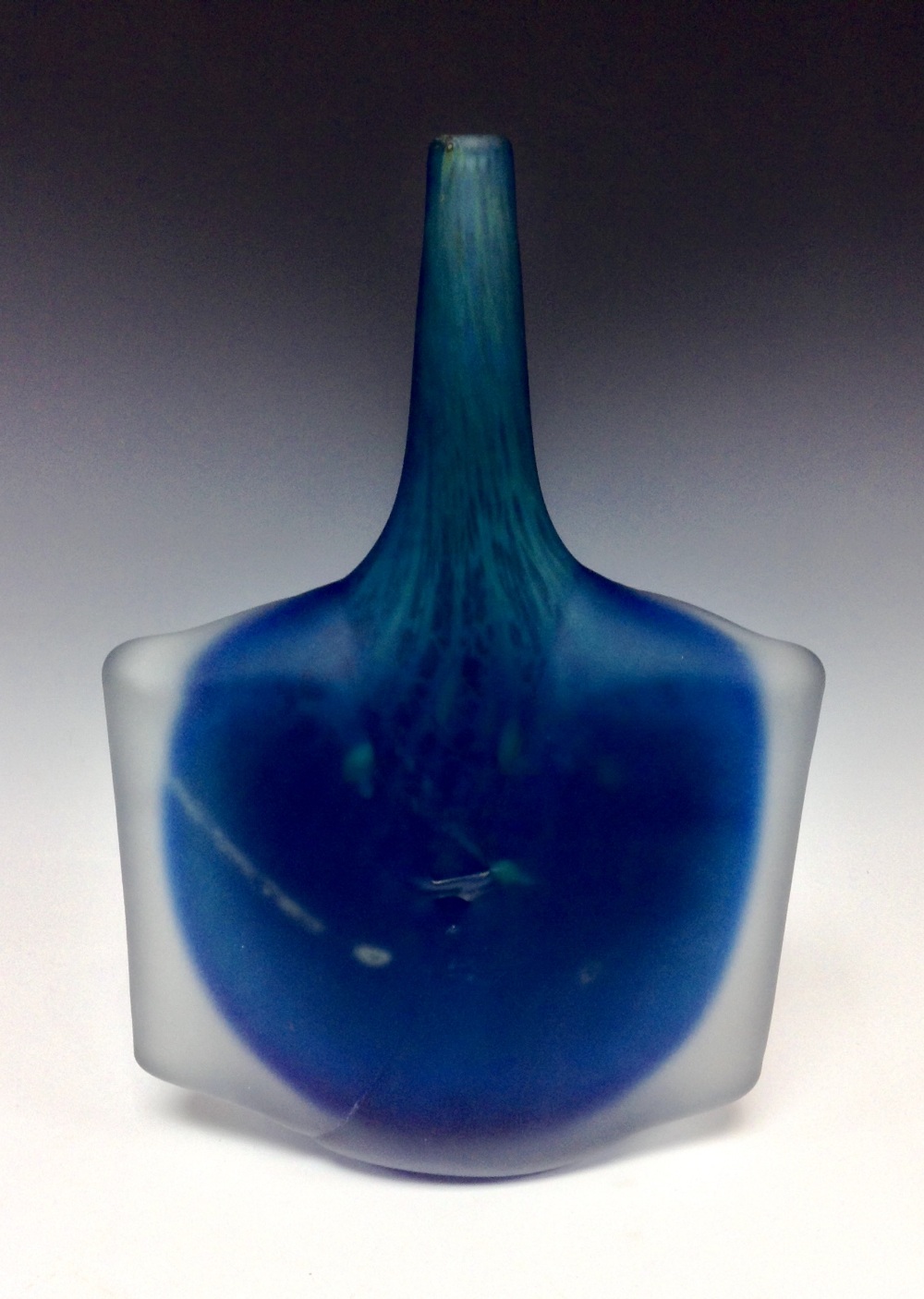 A Mdina studio glass fish vase of axehead shape, frosted blue with internal webbing, signed Mdina,