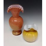 A 19th century Stourbridge glass peach vase with crimpled rim and gold stripes, 23cm high; another,