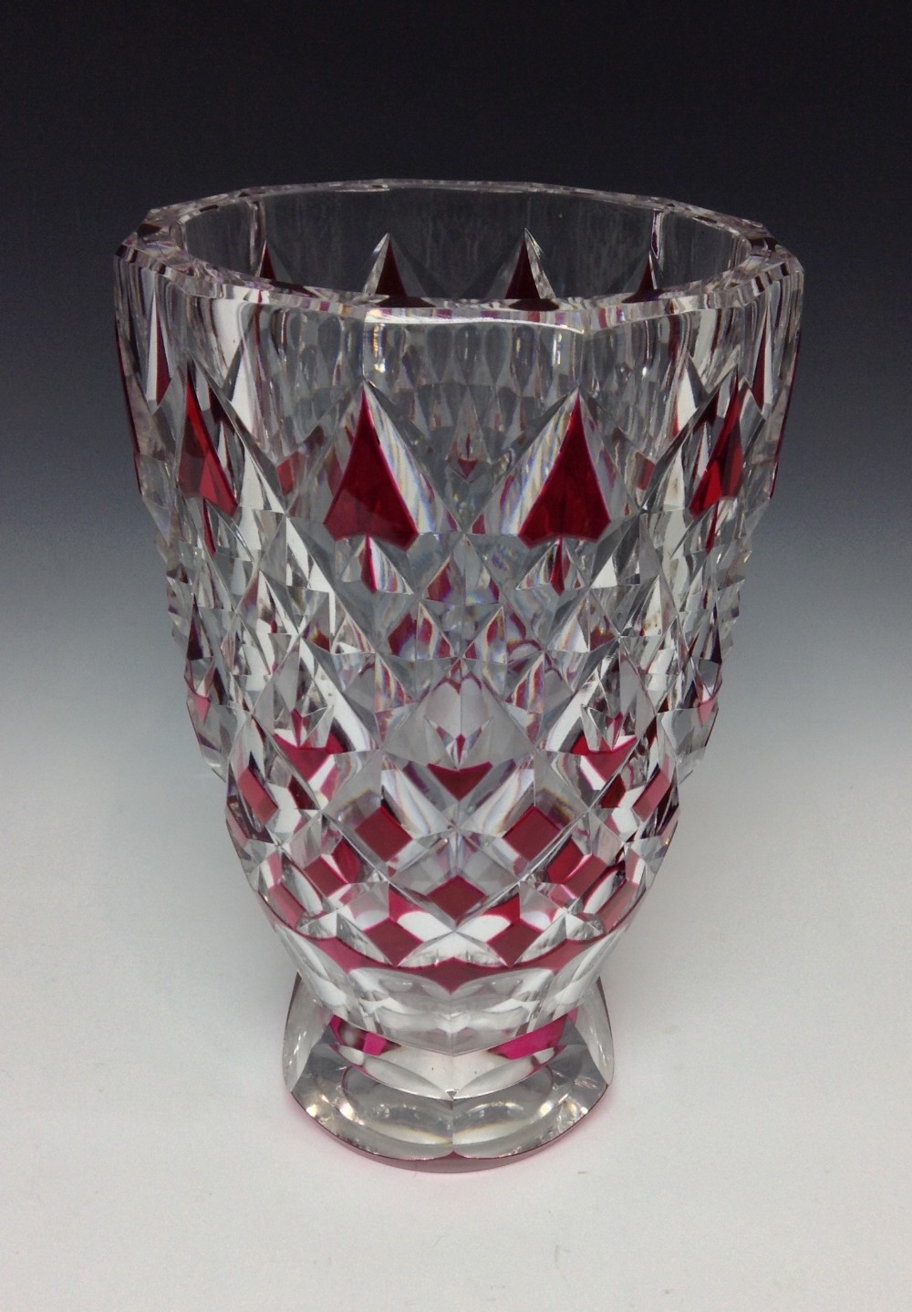 A large Val St Lambert spreading circular glass vase, red flashed dart cut, signed Val St Lambert,