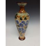 A Royal Doulton inverted baluster vase, decorated with ivy leaves and stylized forget me nots,