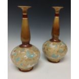 A pair of Doulton Slater's bottle vases,