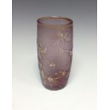 A Daum mauve cyclindrical cameo glass vase, decorated with enamel mistletoe and picked out in gilt,