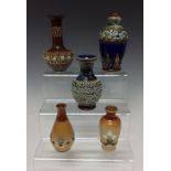 A Royal Doulton miniature bottle vase, designed by Maud Bowden,