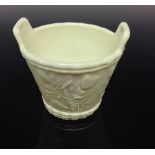 A Sowerby pressed glass Queen's Ivory Ware two-handled basket, decorated in relief with flowers,