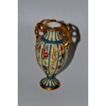 A 19th century French lobed ovoid vase, decorated with alternating fruit,