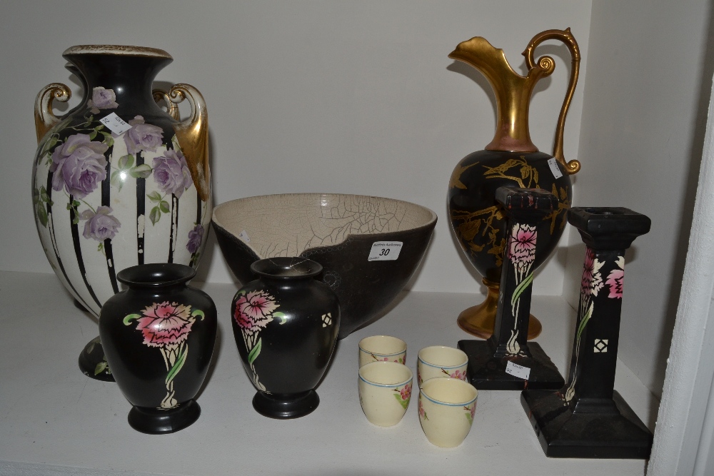 Ceramics - a Shelley Carnation pattern garniture, comprising a pair of ovoid vases and candlesticks,