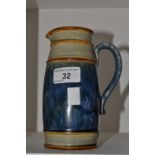 A Royal Doulton stoneware ovoid jug, designed by Ethel Beard,