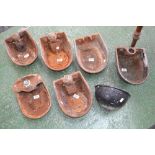Seven cast iron wall mounted cattle troughs including Ogle & Sons,