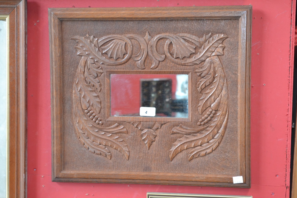 Arts and Crafts carved oak mirror